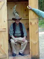 Tiajuana Tom in the outhouse.